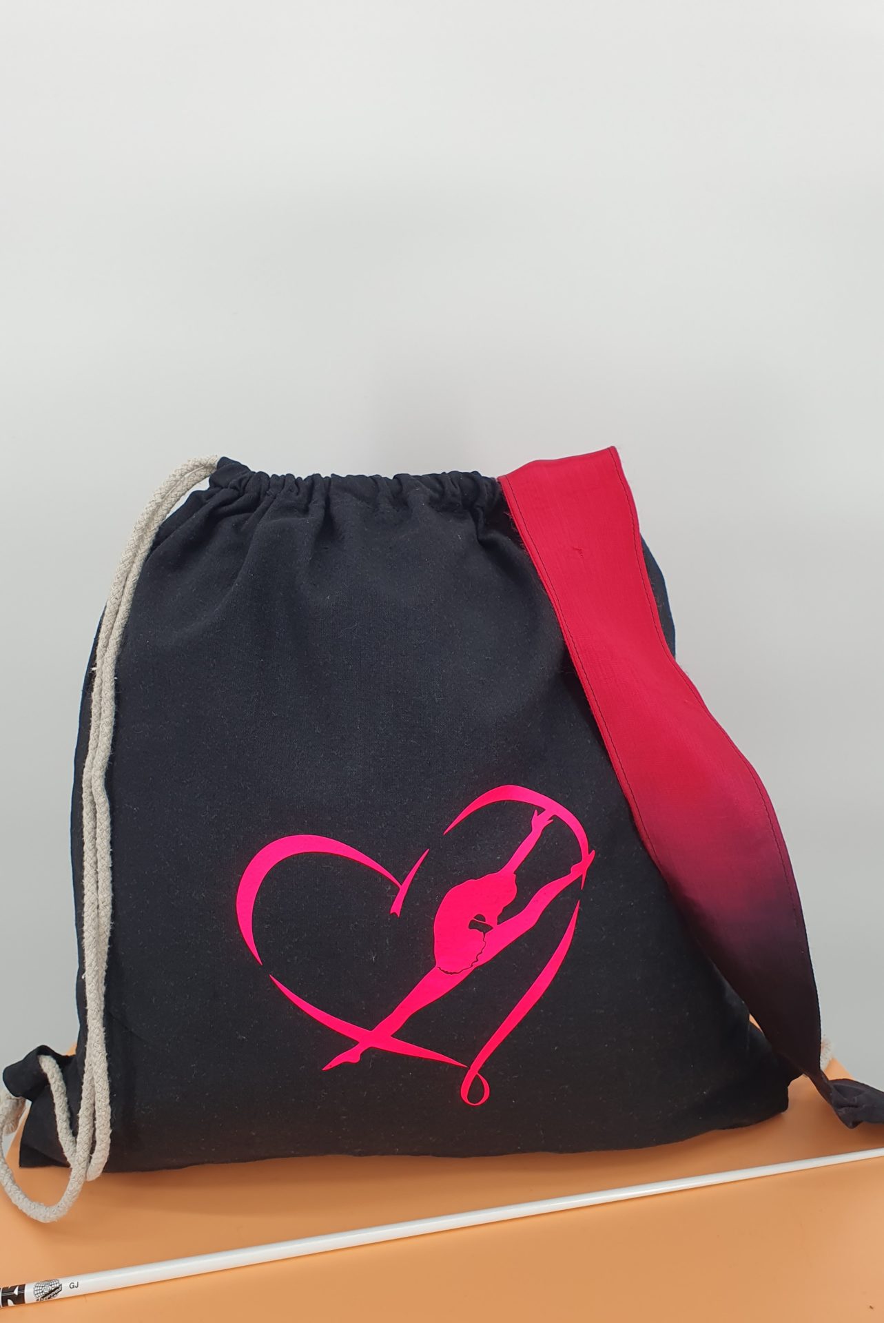 Sac à dos flocage ruban fuchsia fluo