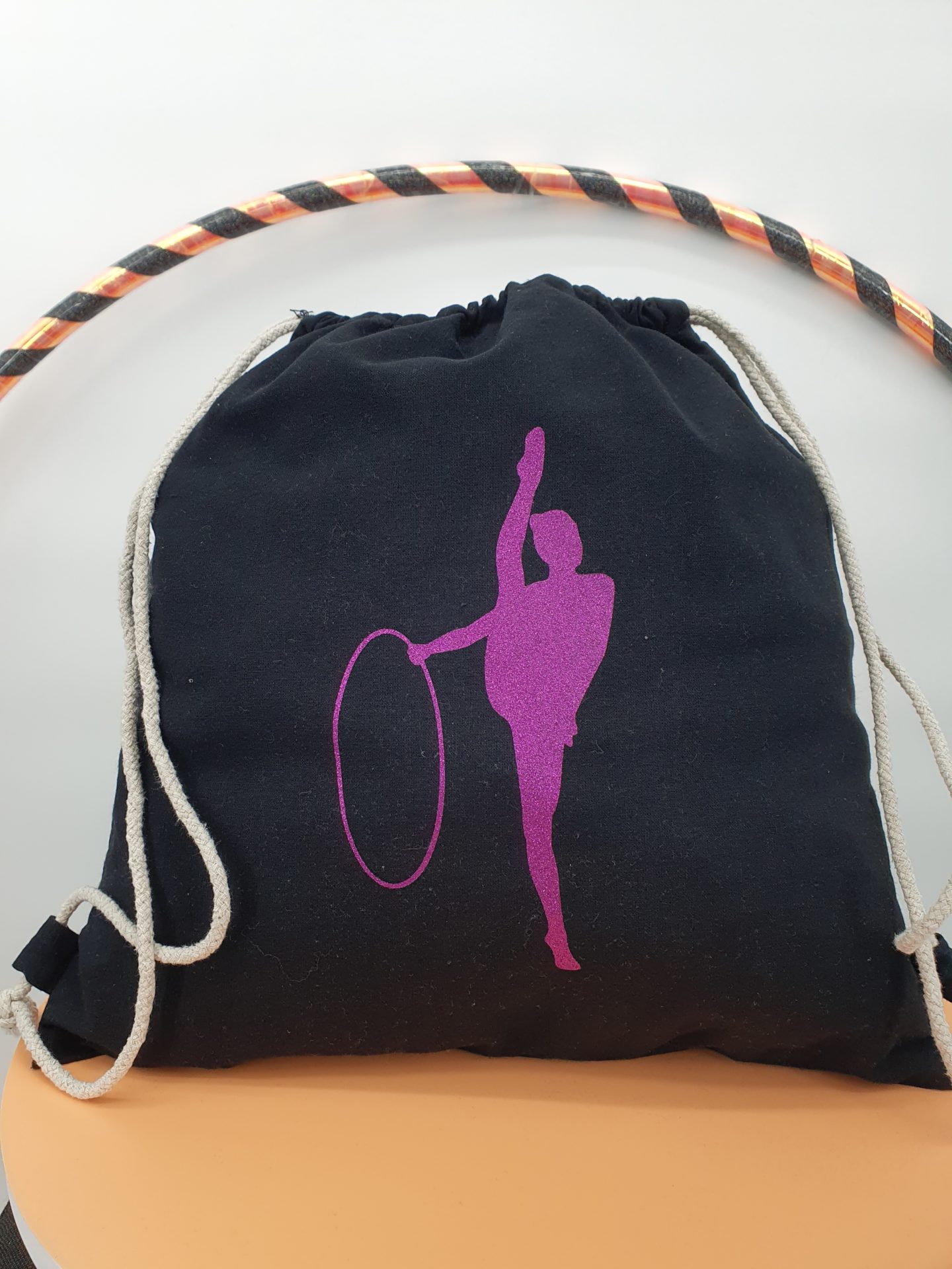 Sac à dos noir flocage cerceau fuchsia pailleté